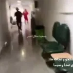 تیم‌هاى جستجو و نجات هلال احمر در داخل ساختمان شیشه اى صدا و سیما